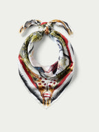 Southwest Spirit wild rag folded with palm, desert, and cowboy prints, red and black trim