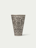 Paisley-patterned cone cup with black line art on a cream base, top rim visible