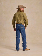 Blue denim dungarees with back yoke and belt loops, rear view on model