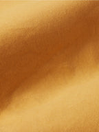 Suntan woven dungaree fabric texture close-up