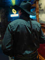 Slate denim snap western shirt on model, back view with yoke and snap placket