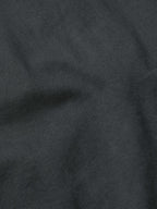 Slate denim fabric close-up with fine woven texture