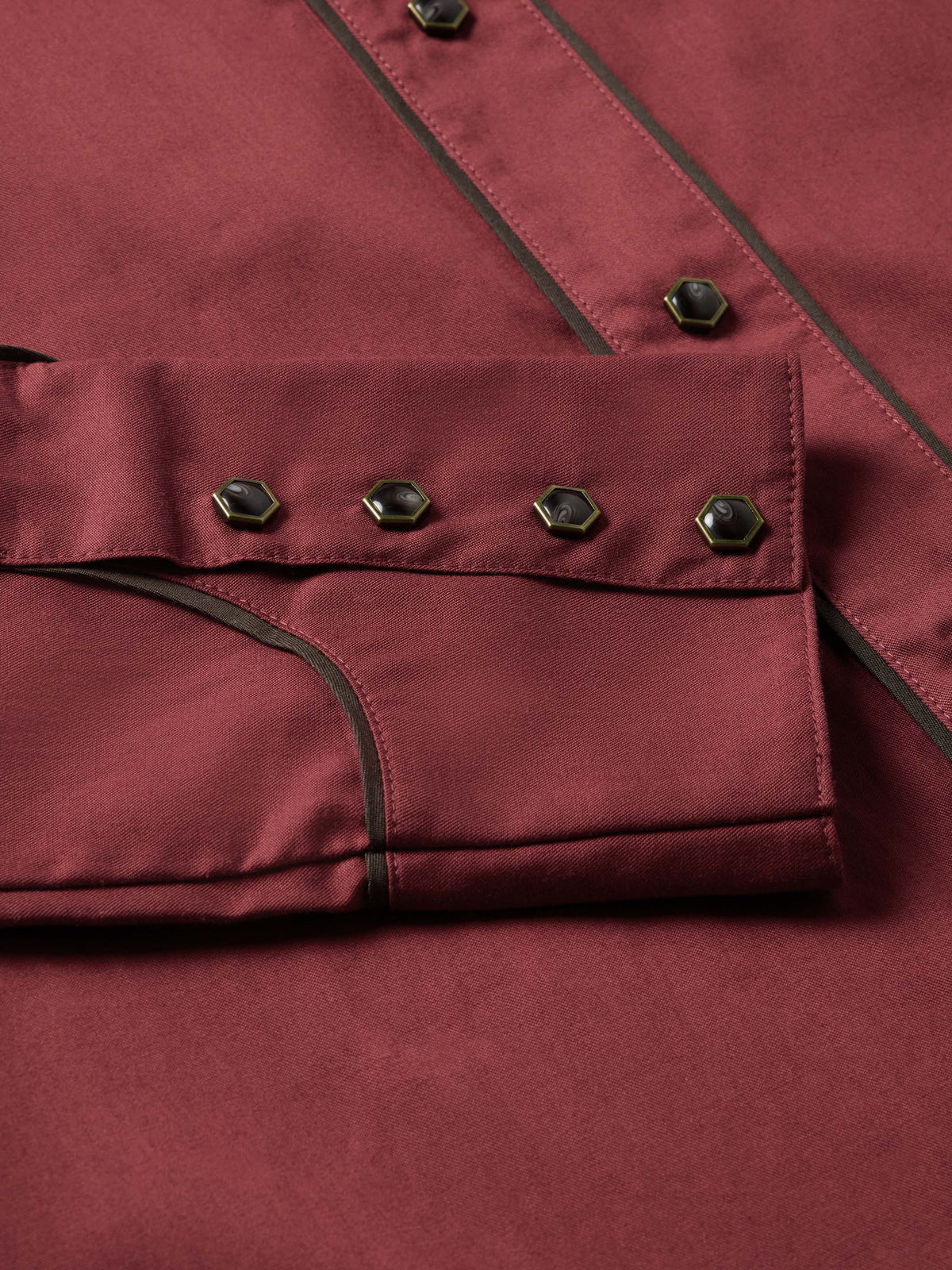 Mahogany snap shirt chest panel with dark trim and row of snap buttons