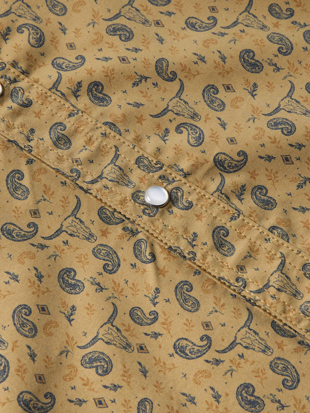 Short sleeve western shirt with pearl snap closure on patterned pocket placket.