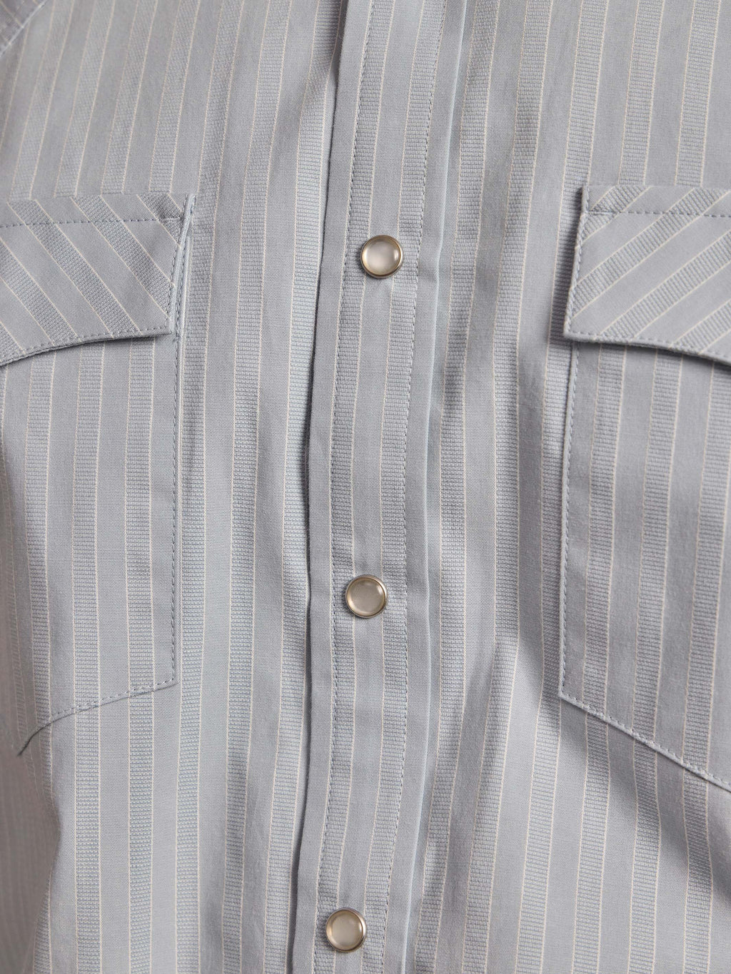 Light blue striped western snap-front shirt with chest pocket and metal snaps
