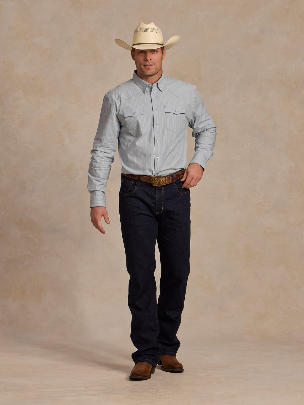 Light blue western button-down shirt with flap chest pockets and long sleeves