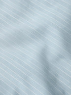 Light blue pinstripe fabric texture with fine vertical stripes