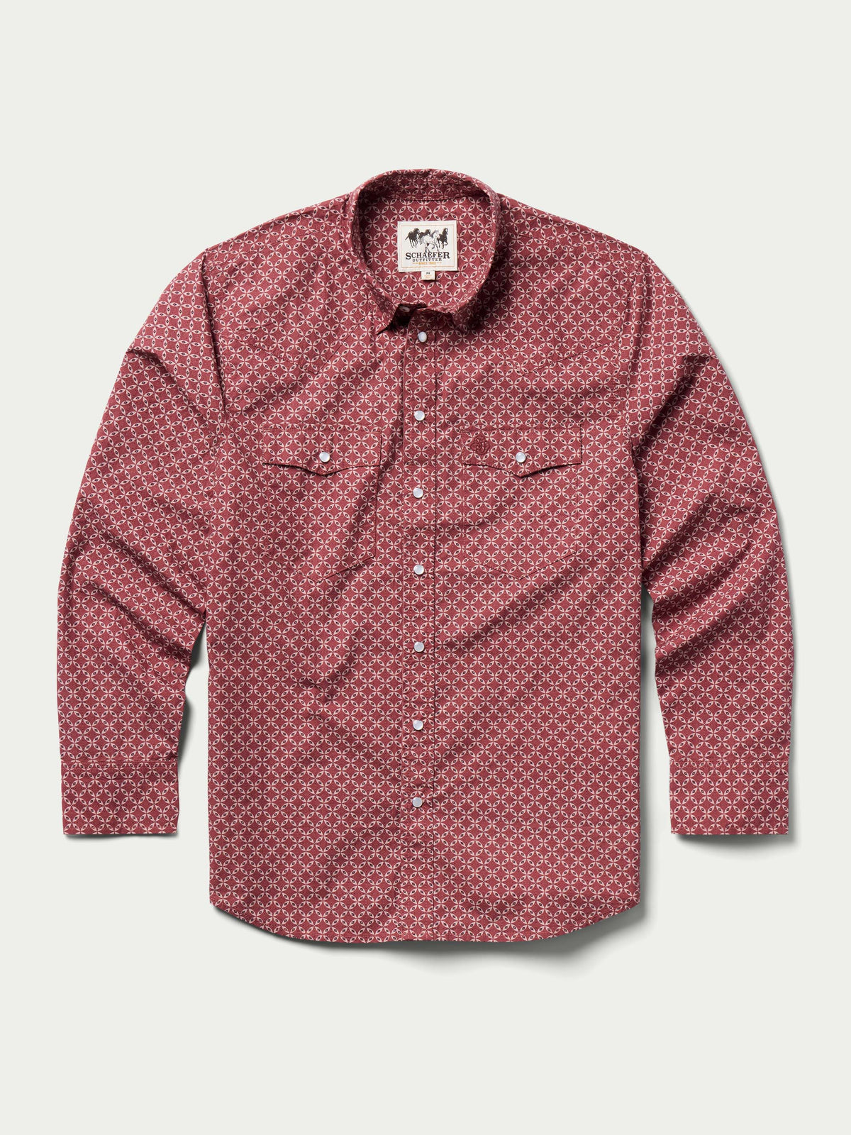 Cotton snap shirt front view in dark red geometric pattern with flap chest pockets.