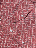 Cotton snap shirt in dark red geometric pattern with visible snap buttons at placket.