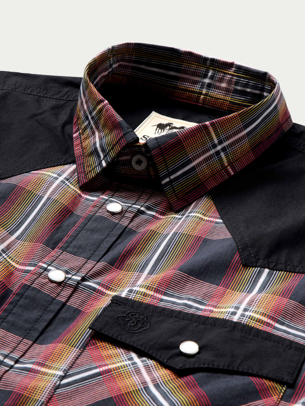 Cotton snap shirt collar and placket, dark plaid with red, yellow, and blue lines