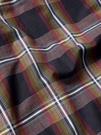 Cotton snap shirt fabric, dark plaid with red, yellow, white, and blue grid lines