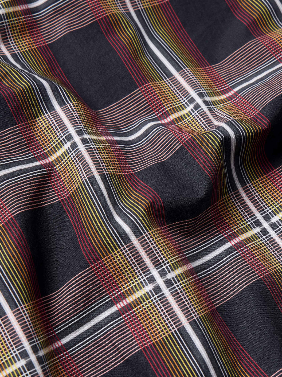Cotton snap shirt fabric, dark plaid with red, yellow, white, and blue grid lines