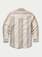 Western snap shirt in tan with blue and red vertical stripes, back view
