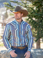 Cowboy wearing Western snap shirt in multicolor vertical stripes with chest pockets