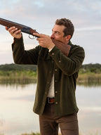 Olive wool overshirt on a man, buttoned front with chest pockets