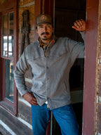 Taupe wool overshirt with button front, chest pocket, and long sleeves