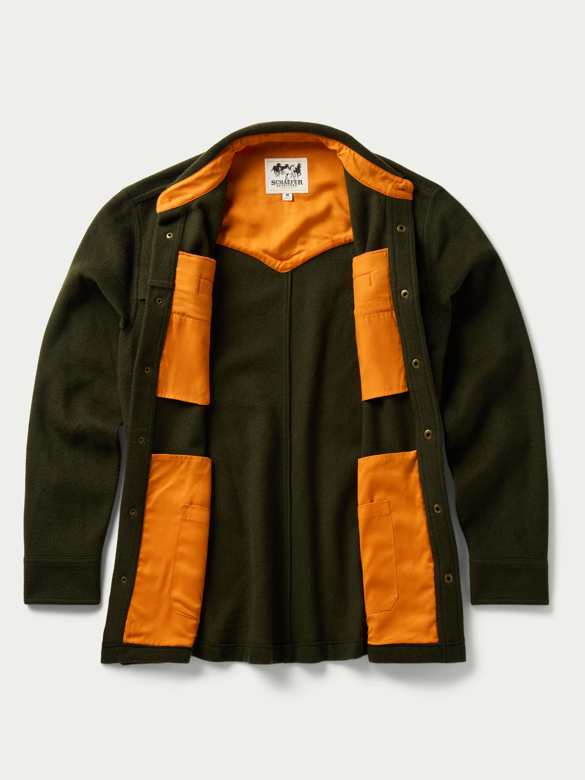 Olive wool overshirt open to show orange inner lining and side pocket details.