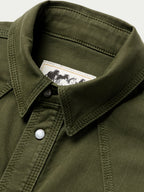 Dark olive denim snap shirt with snap button at collar and contrast stitching