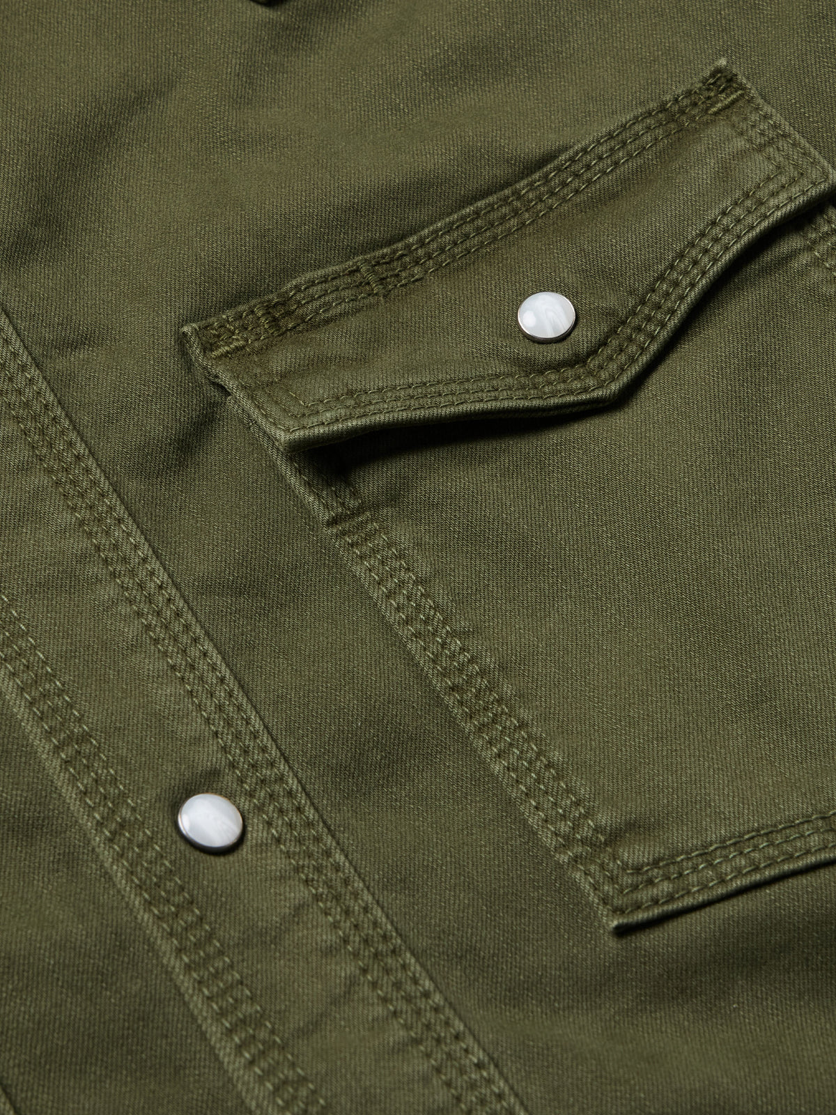 Dark olive denim snap shirt chest pocket with white snap button