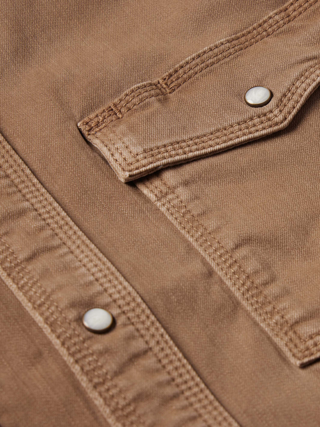 Khaki denim snap shirt pocket flap with round snap buttons