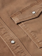 Khaki denim snap shirt pocket flap with round snap buttons