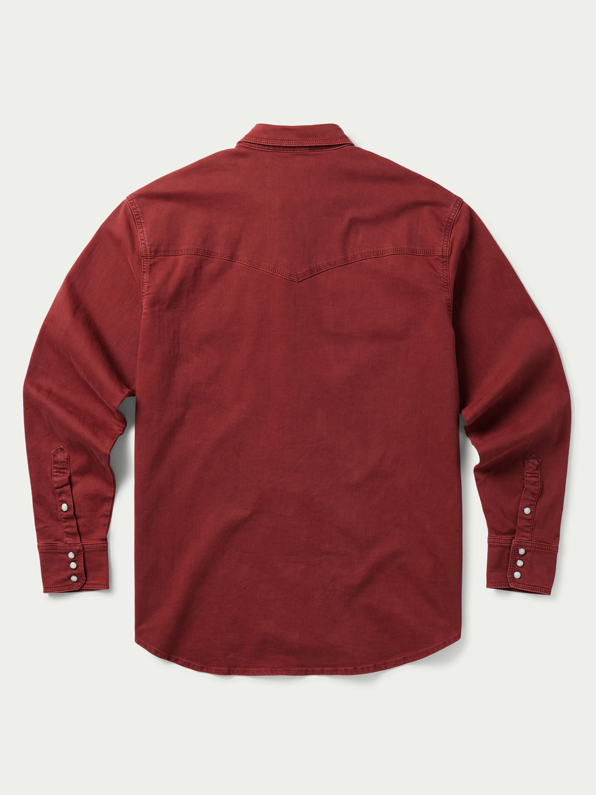 Rust Western denim snap shirt back view with buttoned yoke and long sleeves