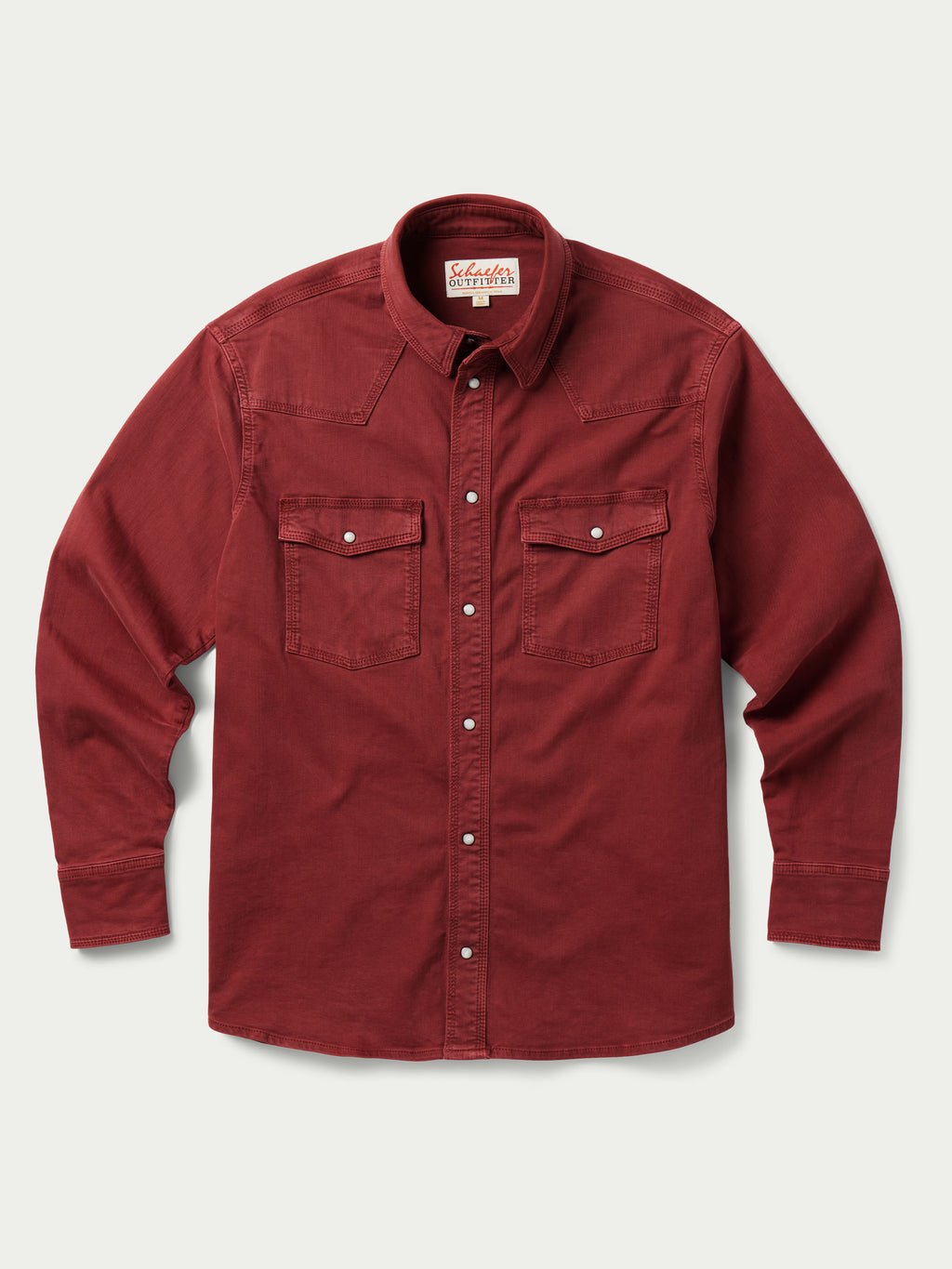 Rust Western denim snap shirt with point collar and two chest flap pockets