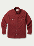 Rust Western denim snap shirt with point collar and two chest flap pockets