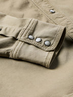 Sage western snap denim shirt cuff with three snap buttons and stitched seam