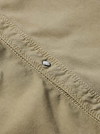 Sage western snap denim shirt placket close-up with topstitching