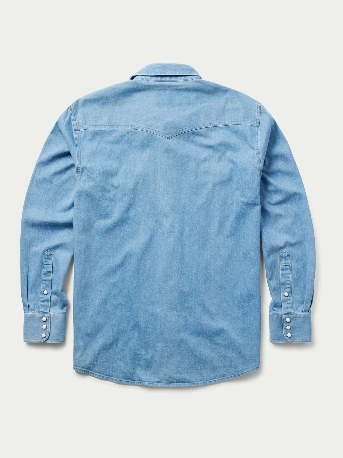 Light-wash denim snap shirt, long-sleeve with button snaps and western yoke, back view