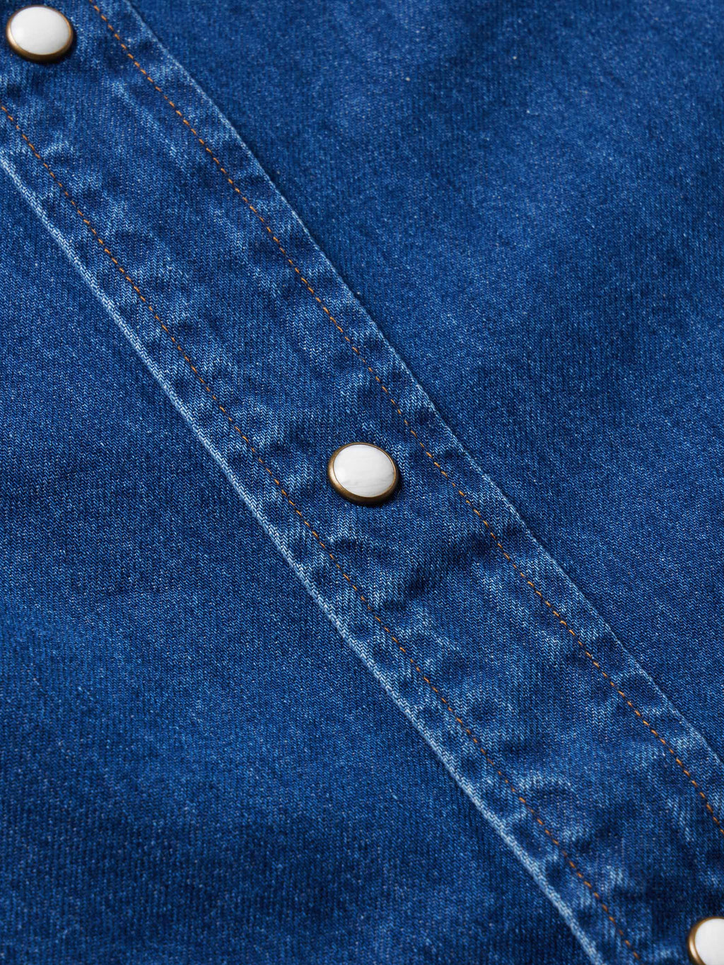 Dark indigo denim snap shirt with snap placket and button detail