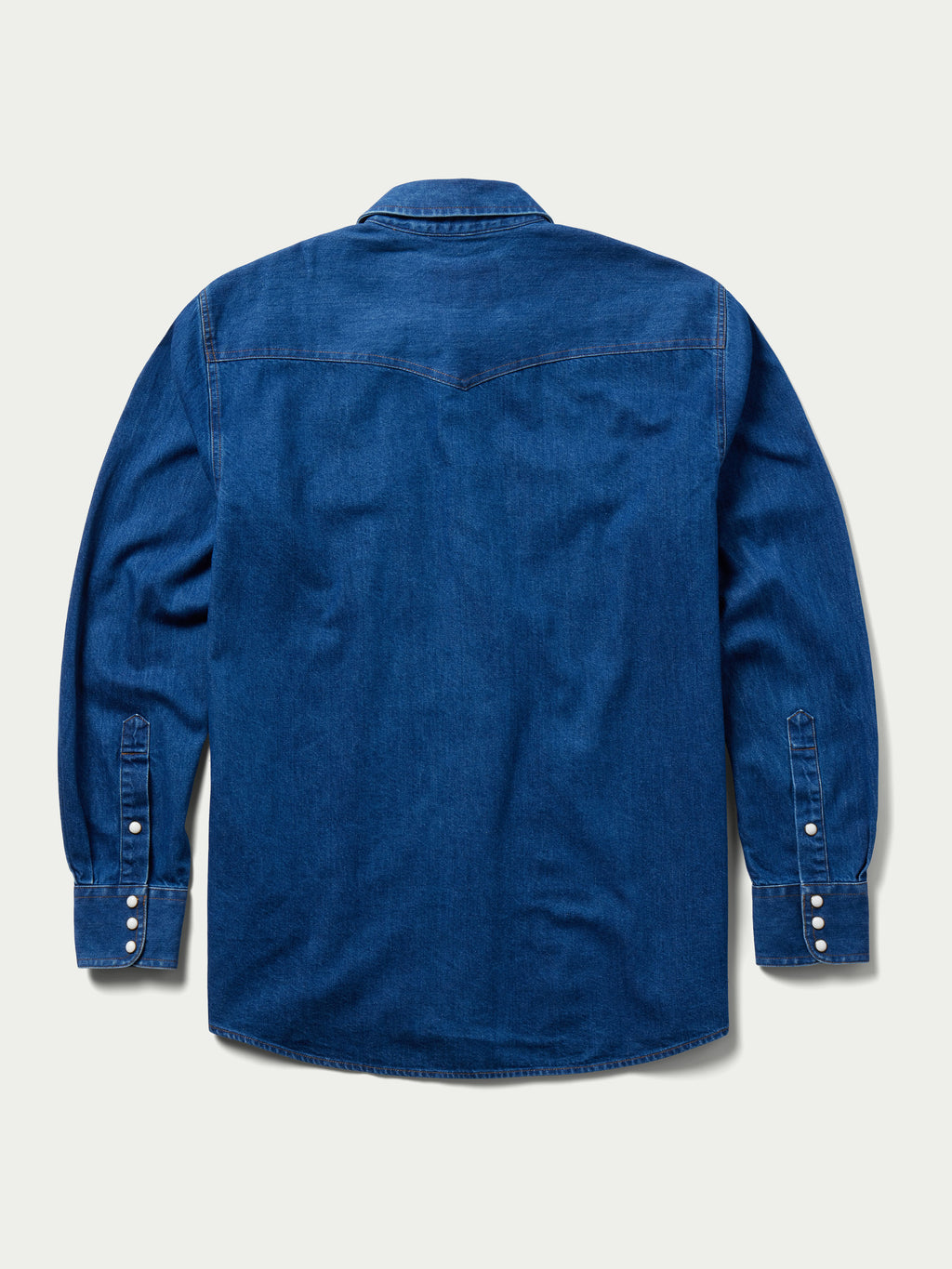 Dark indigo denim snap shirt, back view