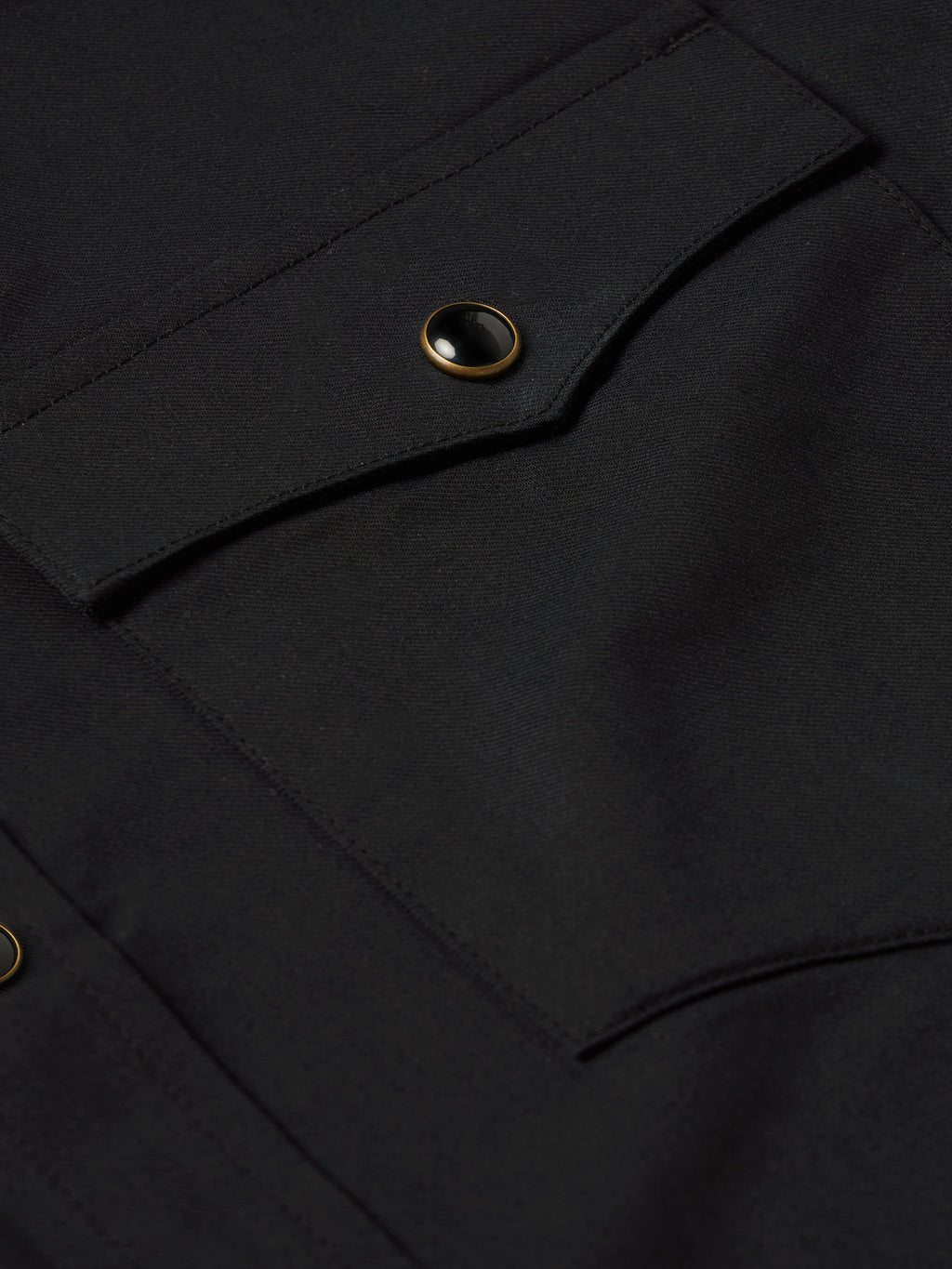 Black chest pocket with snap button detail