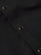 Black shirt cuff with snap buttons
