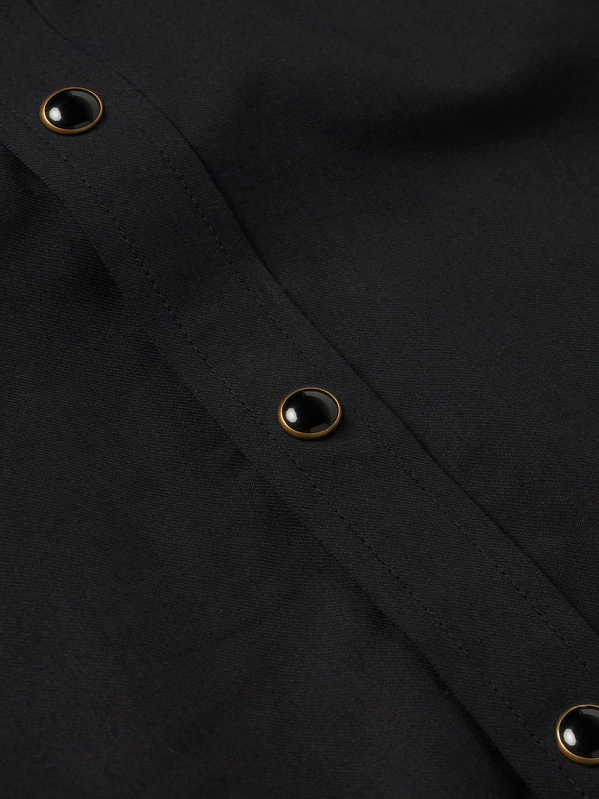 Black shirt cuff with snap buttons