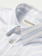 Light blue striped button-down shirt collar with snap placket and inner label