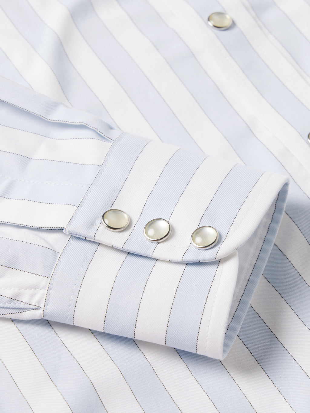 Light blue striped Western button-down shirt with snap cuff closures