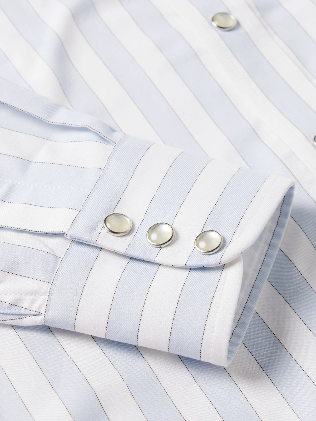 Light blue striped Western button-down shirt with snap cuff closures
