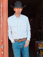 Light blue striped Western button-down shirt with snap cuffs and chest pockets