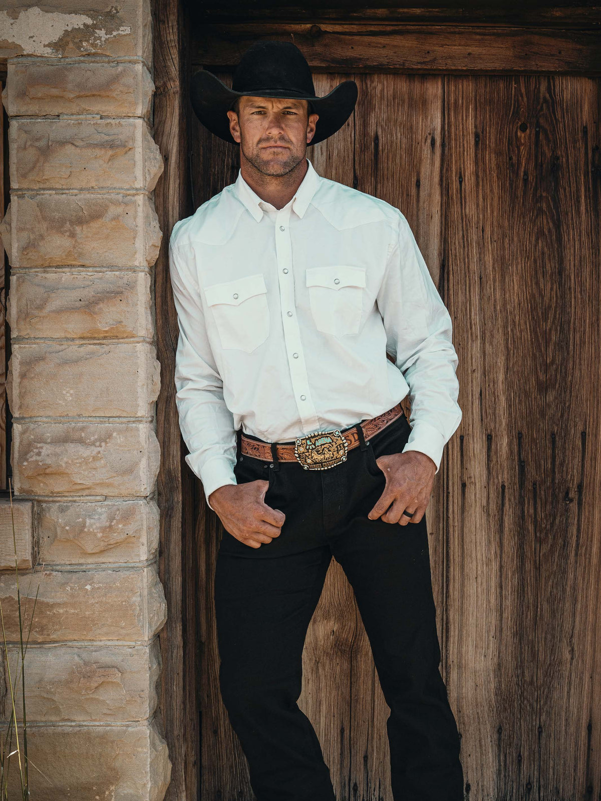White western button-down shirt with snap front worn with dark pants