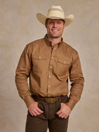 Walnut slub twill button-up shirt with chest pockets, worn on model