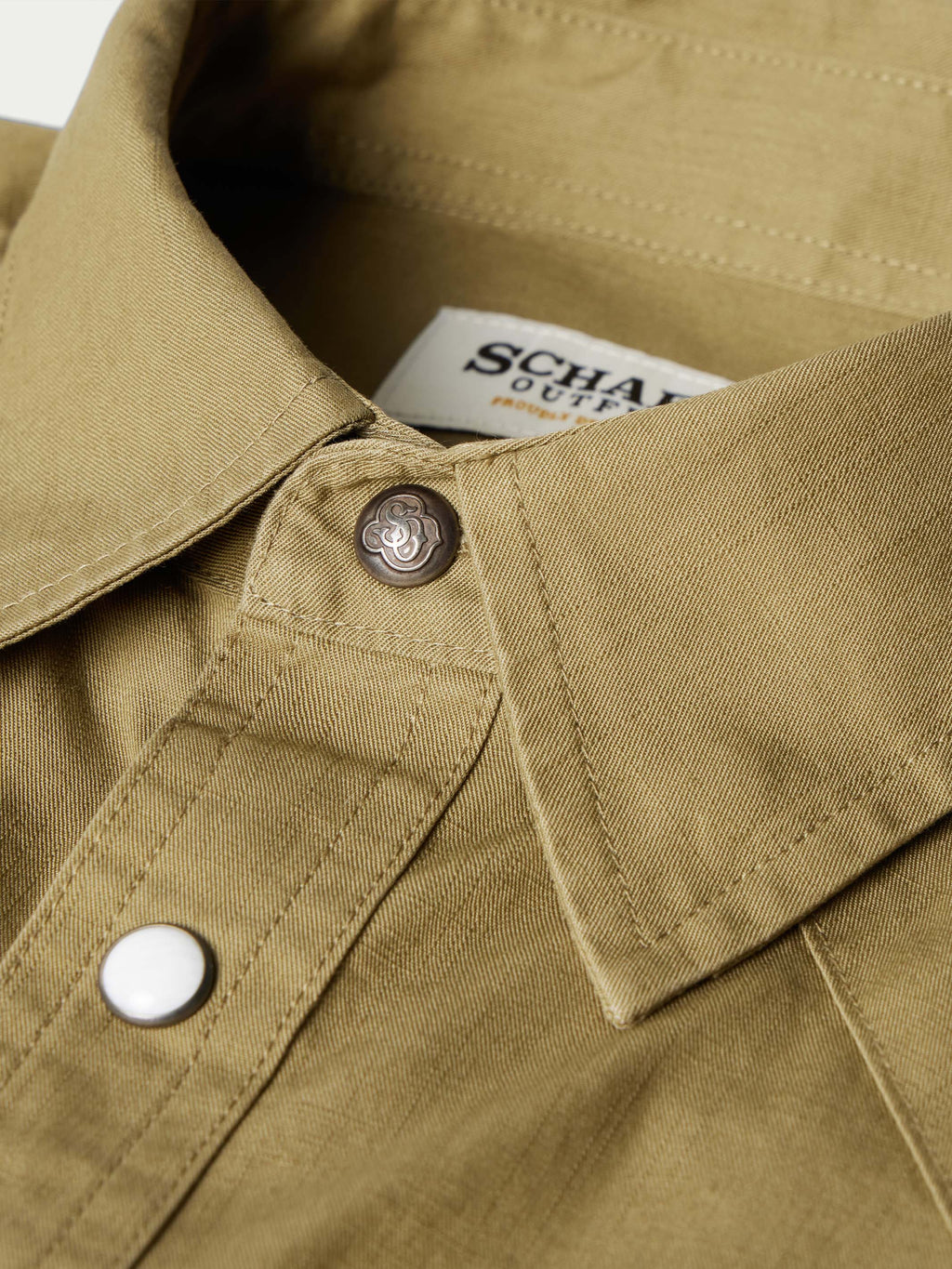 Olive slub twill shirt with snap-down collar and interior label