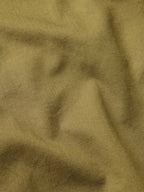 Olive slub twill fabric close-up with subtle slub texture