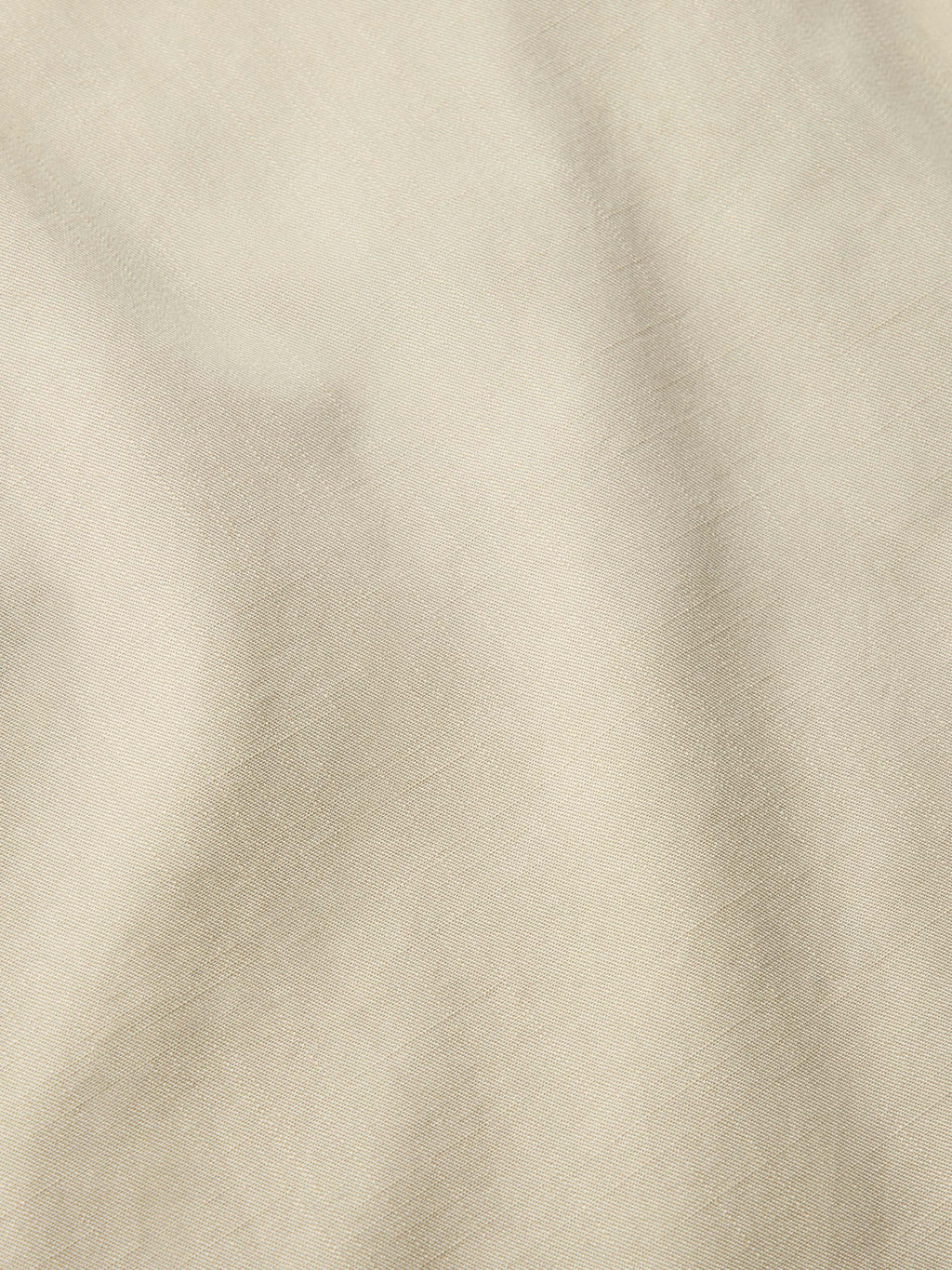 Quail slub twill fabric close-up with fine textured weave