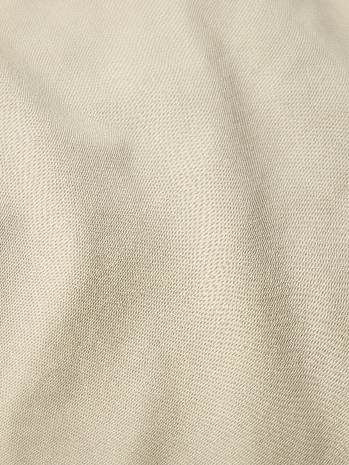 Quail slub twill fabric close-up with fine textured weave