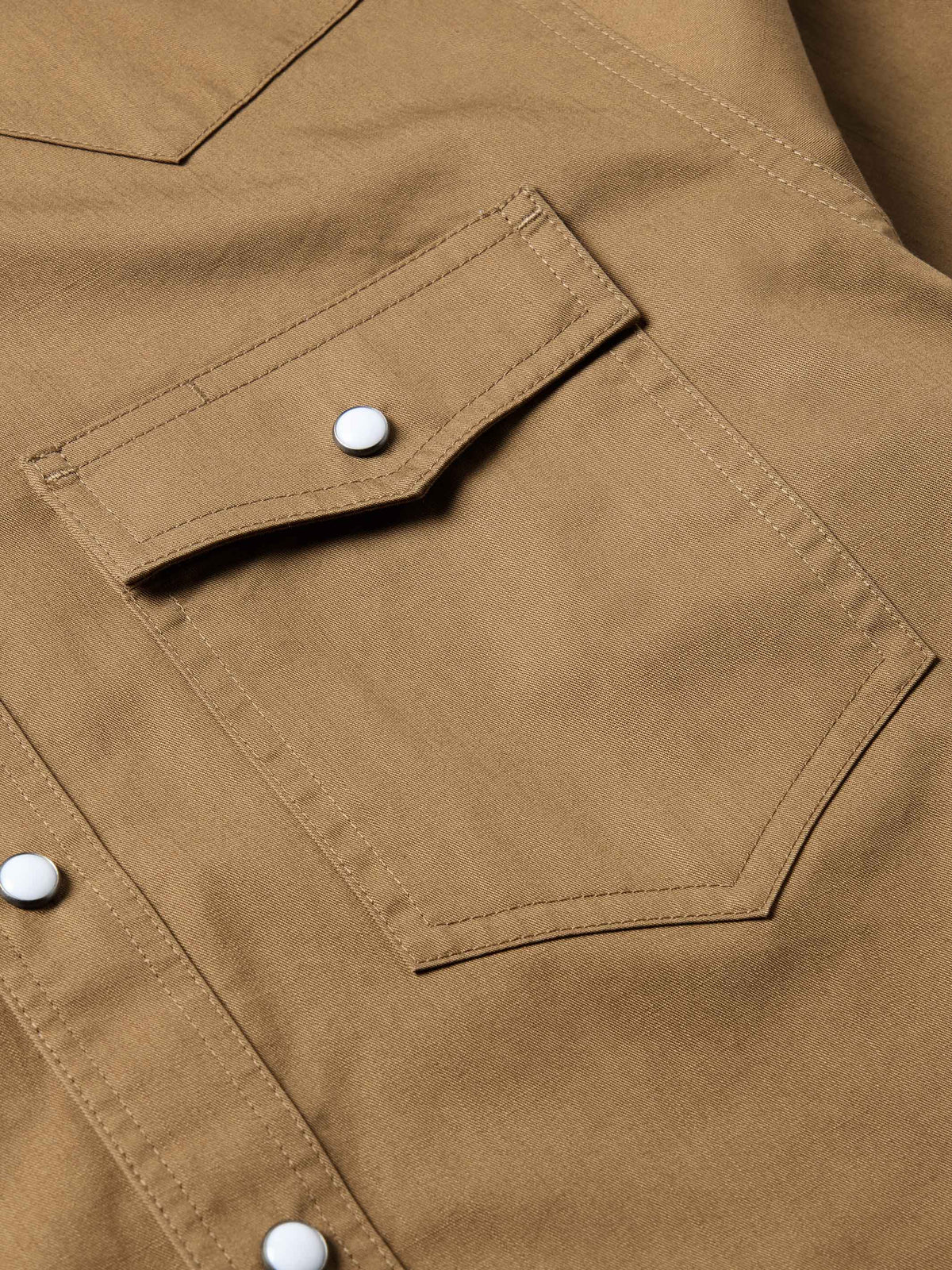 Walnut slub twill shirt sleeve placket with white snap button