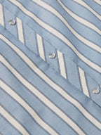 Blue-and-white striped short-sleeve pearl snap shirt, front placket detail