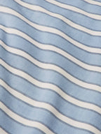 Blue and white striped fabric view of a short-sleeve pearl snap shirt