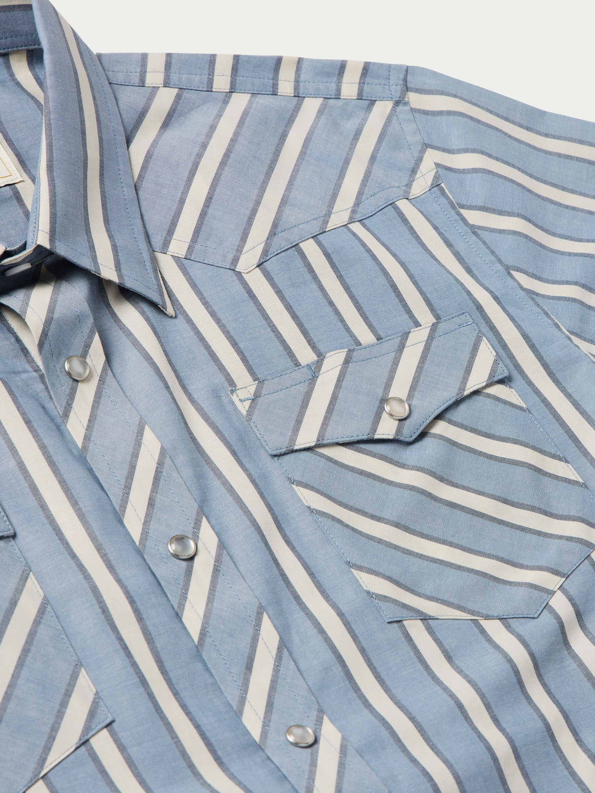 Striped short-sleeve pearl snap shirt with chest pocket, yoke, and snap buttons